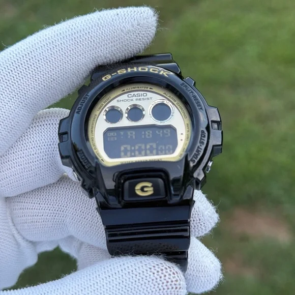 G-SHOCK Black and Gold Digital Watch men’s
